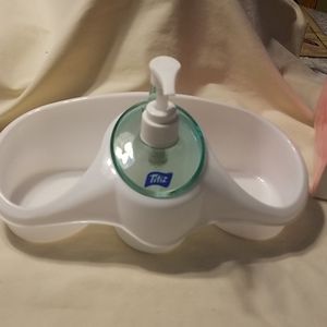 Soap dispensing sponge holder